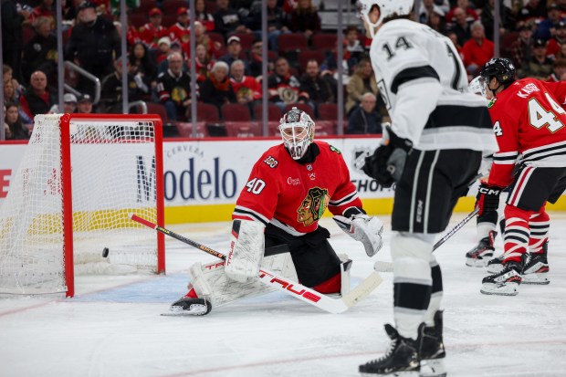 Los Angeles Kings right wing Alex Laferriere (14) scores a goal past Chicago Blackhawks goaltender Arvid Soderblom (40) during the second period at the United Center Sunday Oct. 26, 2025 in Chicago. (Armando L. Sanchez/Chicago Tribune)