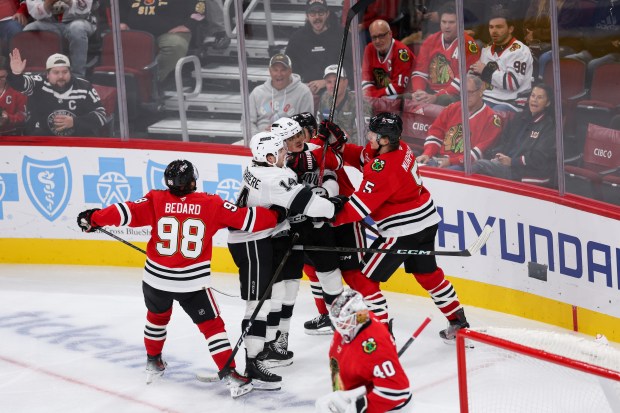 Los Angeles Kings and Chicago Blackhawks players scuffle during the third period at the United Center Sunday Oct. 26, 2025 in Chicago. (Armando L. Sanchez/Chicago Tribune)