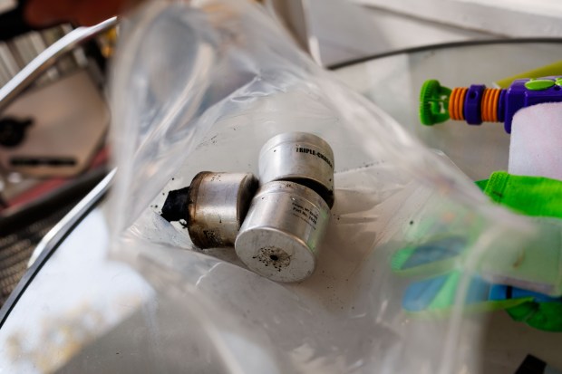 Former Cook County prosecutor Brian Kolp kept the tear gas canisters used by border patrol officers in Irving Park. Residents say a landscaper worker, a resident of the area, and a woman on a bike were detained on the 3700 block of North Kildare Avenue Saturday Oct. 25, 2025 in Chicago. (Armando L. Sanchez/Chicago Tribune)