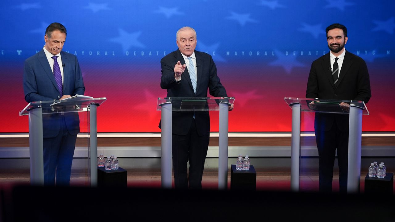 From left, Independent candidate former New York Gov. Andrew Cuomo, Republican candidate Curtis Sliwa and Democratic candidate Zohran Mamdani participate in a mayoral debate, Thursday, Oct. 16, 2025, in New York. (AP Photo/Angelina Katsanis, Pool)