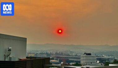 Tens of thousands of people without power as south-east Queensland suffers heat, fires, smoke a day after storm hits