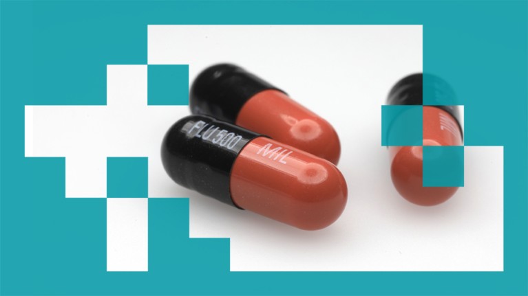 Three 500mg capsules of Flucloxacillin, an antibiotic medication, pictured on a white surface.
