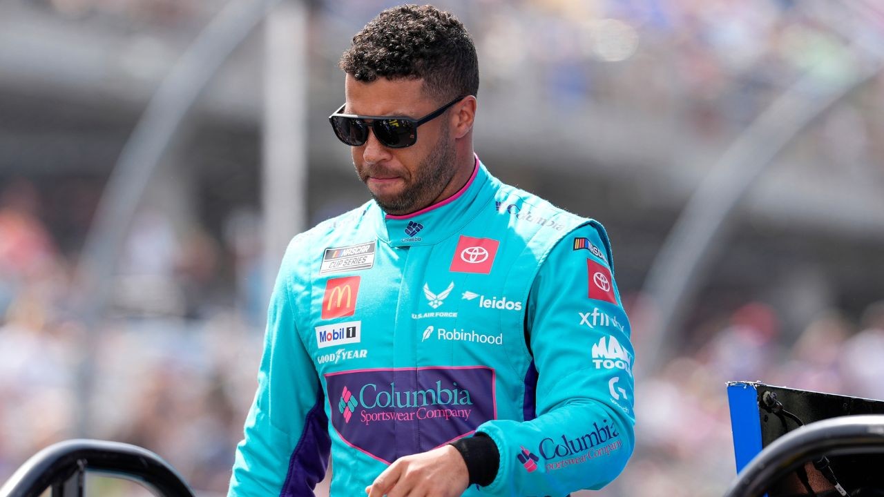 Sep 6, 2025; Madison, Illinois, USA; NASCAR Cup Series driver Bubba Wallace (23) looks on during practice and qualifying for the Enjoy Illinois 300 at World Wide Technology Raceway.