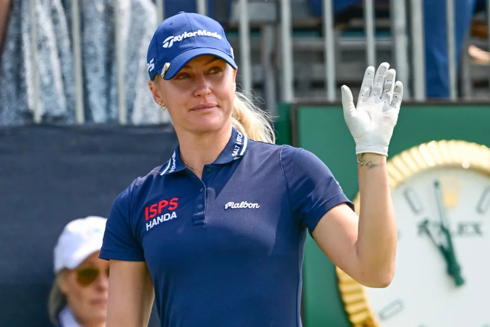Jun 1, 2025; Erin, Wisconsin, USA; Charley Hull waves to fans during the final round of the U.S. Women's Open golf tournament.Benny Sieu-Imagn Images&period;