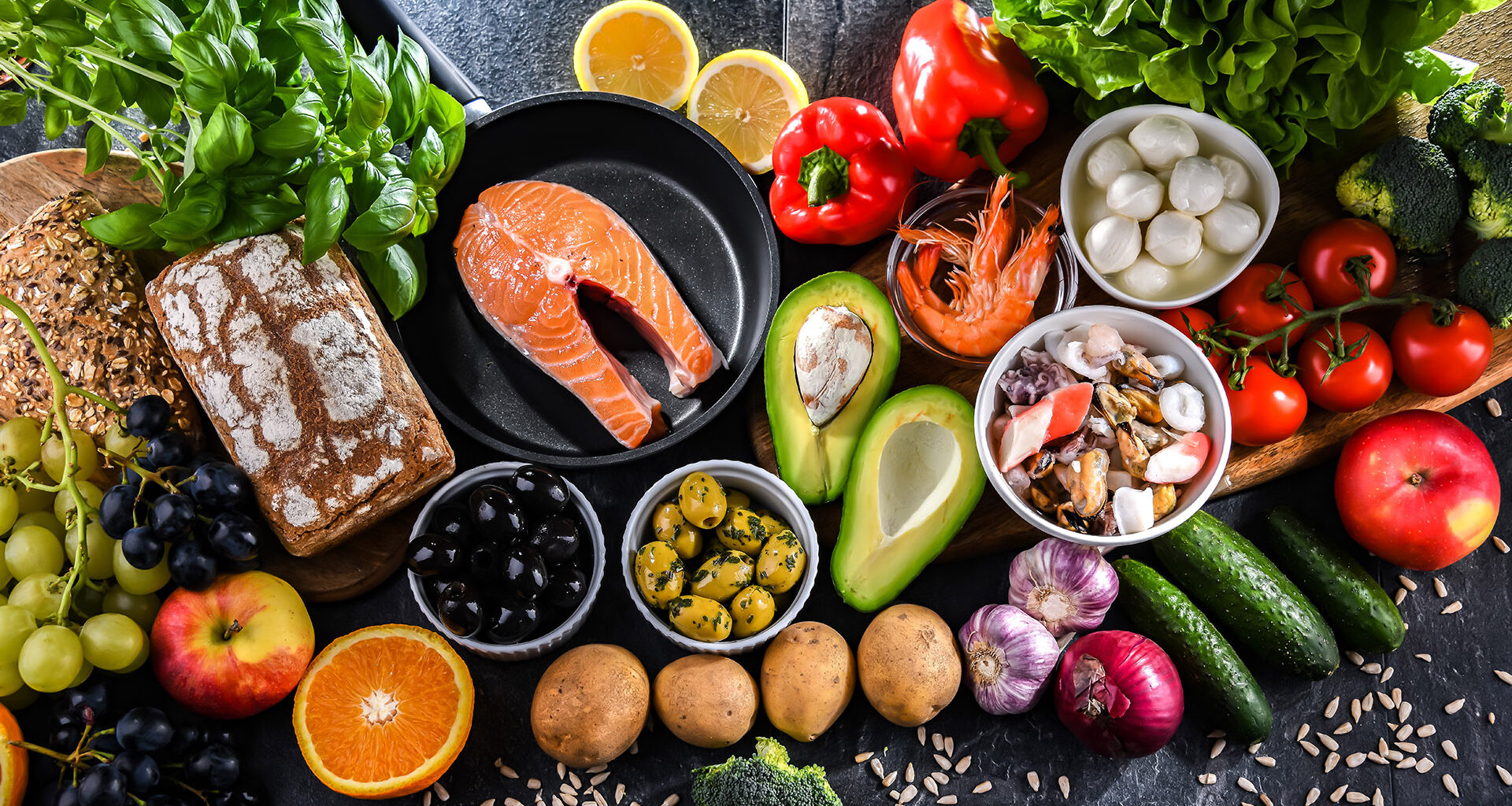 Fish, vegetables, and other foods found in Mediterranean diet.