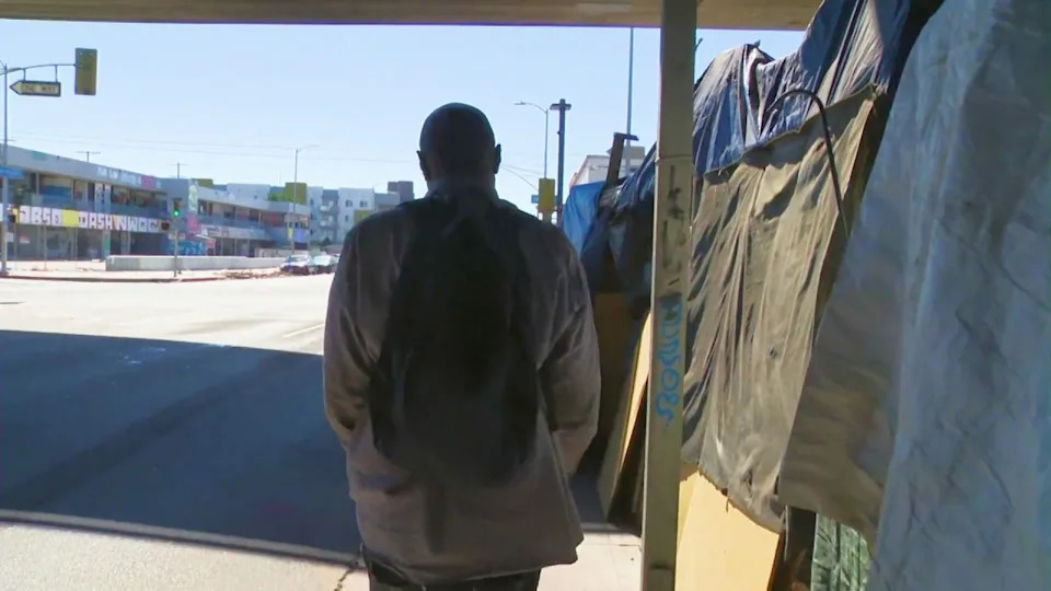 A man who lives in the encampment said he and many others are waiting for shelter beds to open up and have no choice but to live in squalid conditions in the meantime. (KTLA)