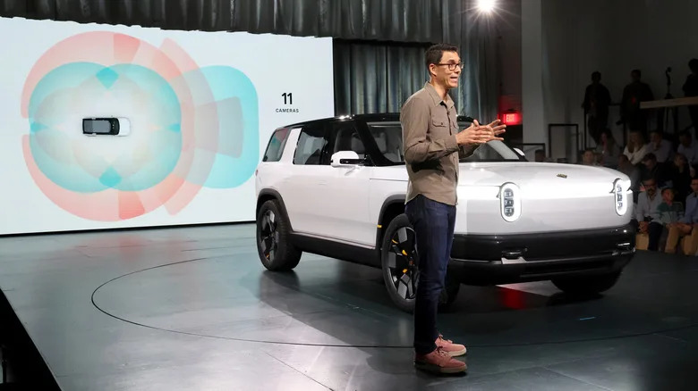Founder and CEO of Rivian RJ Scaringe speaks onstage during the Rivian Reveals All-Electric R2 Midsize SUV event at Rivian South Coast Theater on March 07, 2024 in Laguna Beach, California.