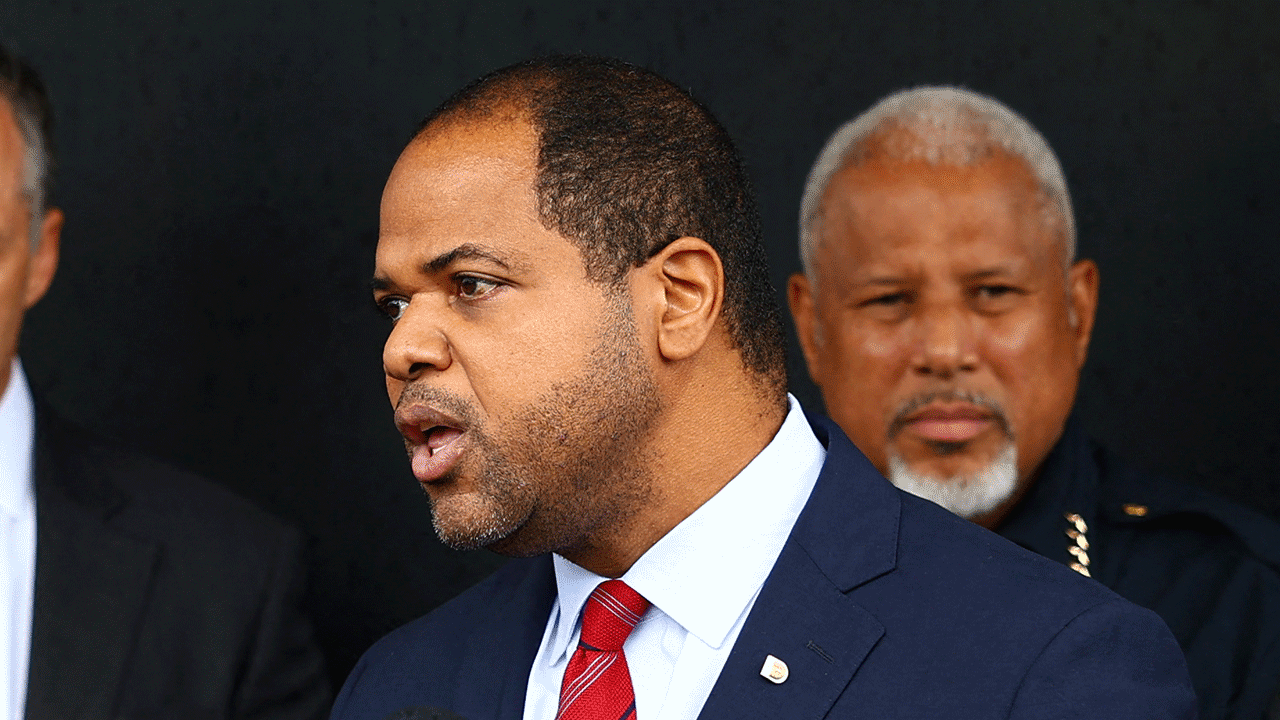 eric johnson speaking during conference