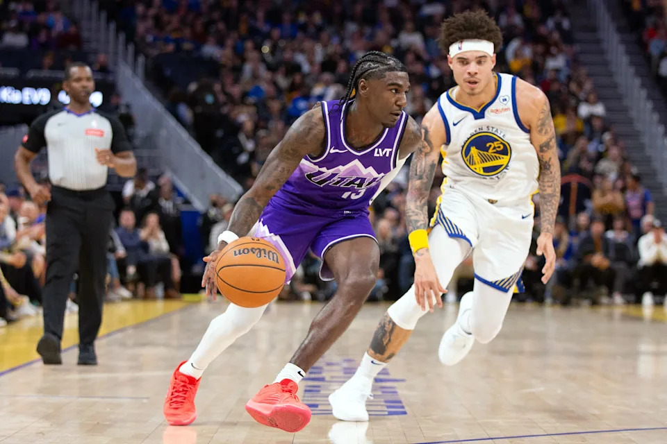 Apr 14, 2024; San Francisco, California, USA; Utah Jazz guard Kira Lewis Jr. (13) drives past Golden State Warriors guard Lester Quinones (25) during the fourth quarter at Chase Center. Mandatory Credit: D. Ross Cameron-USA TODAY Sports
