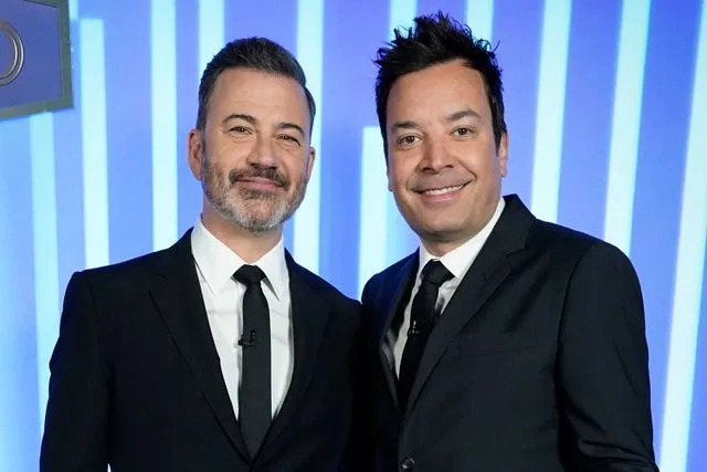 Evans Vestal Ward/NBC via Getty Jimmy Kimmel and Jimmy Fallon, from left
