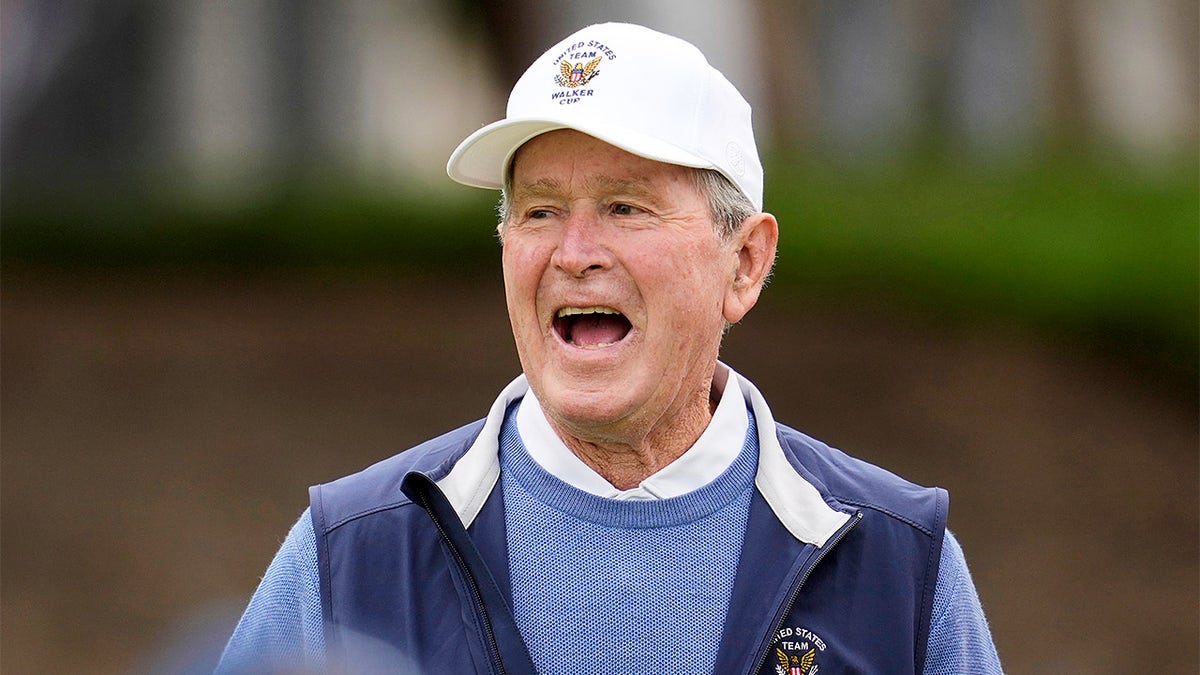 George W. Bush reacts