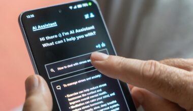 A person holds a phone and taps on an AI chatbot.