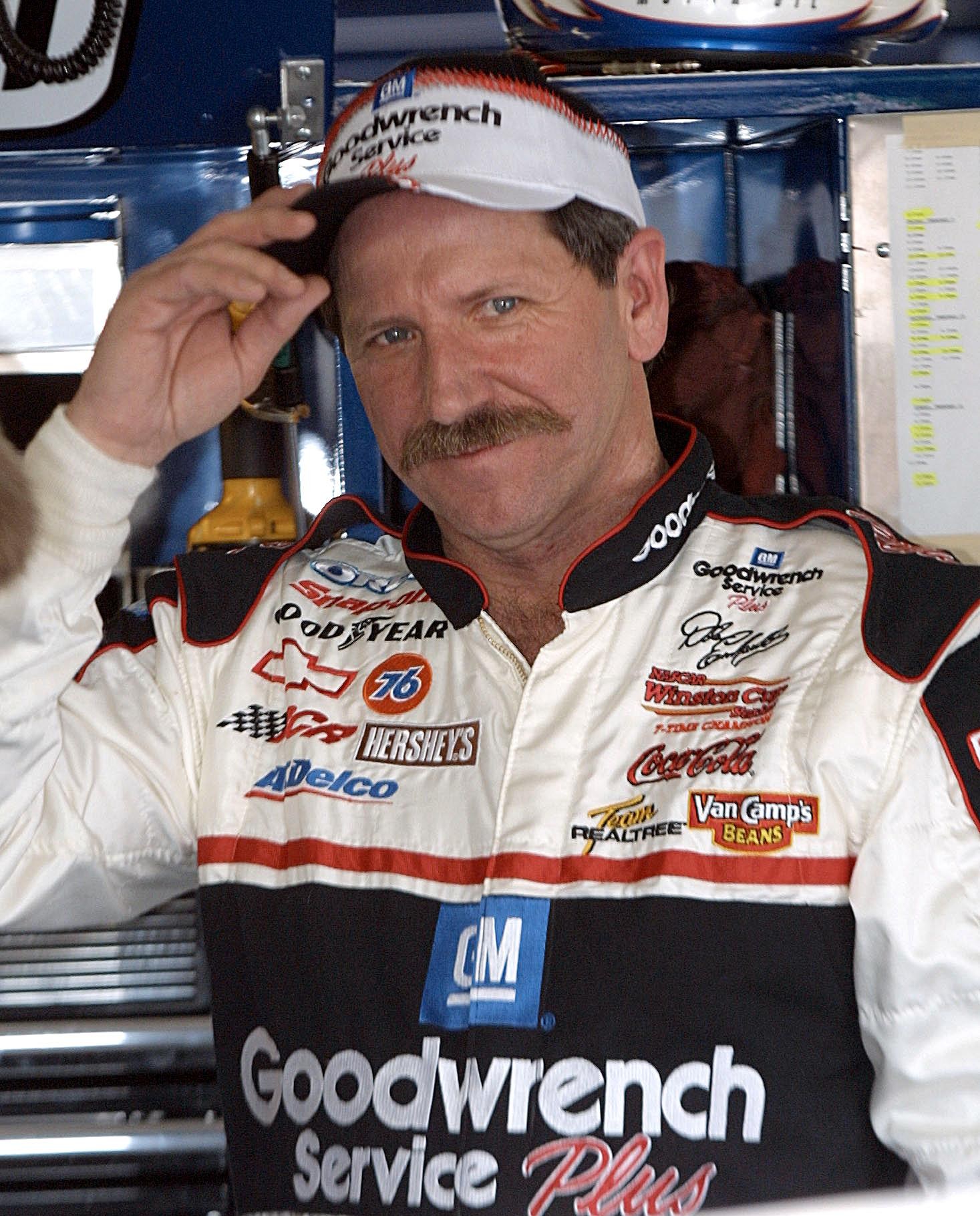 DAYTONA BEACH, UNITED STATES: This 09 February 2001 photo shows NASCAR legend Dale Earnhardt as he prepares for the season-opening Daytona 500 at the Daytona International Speedway in Florida. Earnhardt, 49, one of the greatest stars in auto racing history, died 18 February 2001 from injuries in a crash on the final lap at the Daytona 500. AFP PHOTO/BRIAN CLEARY (Photo credit should read BRIAN CLEARY/AFP via Getty Images)