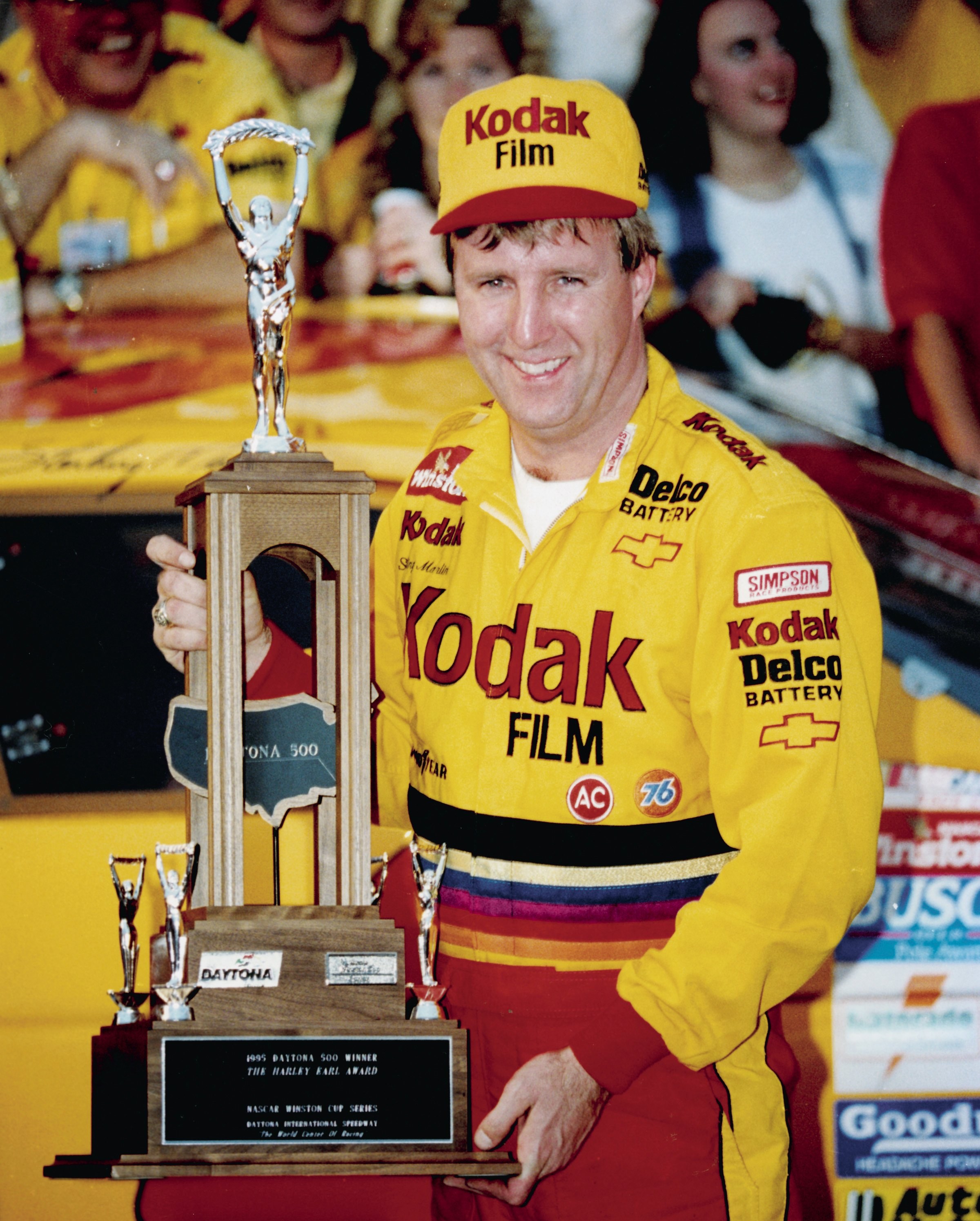 DAYTONA BEACH, FL - FEBRUARY 19, 1995: Colorful winner Sterling Marlin enjoys taking consecutive Daytona 500 winning trophies after his victory in the 1995 race. (Photo by ISC Archives/CQ-Roll Call Group via Getty Images)