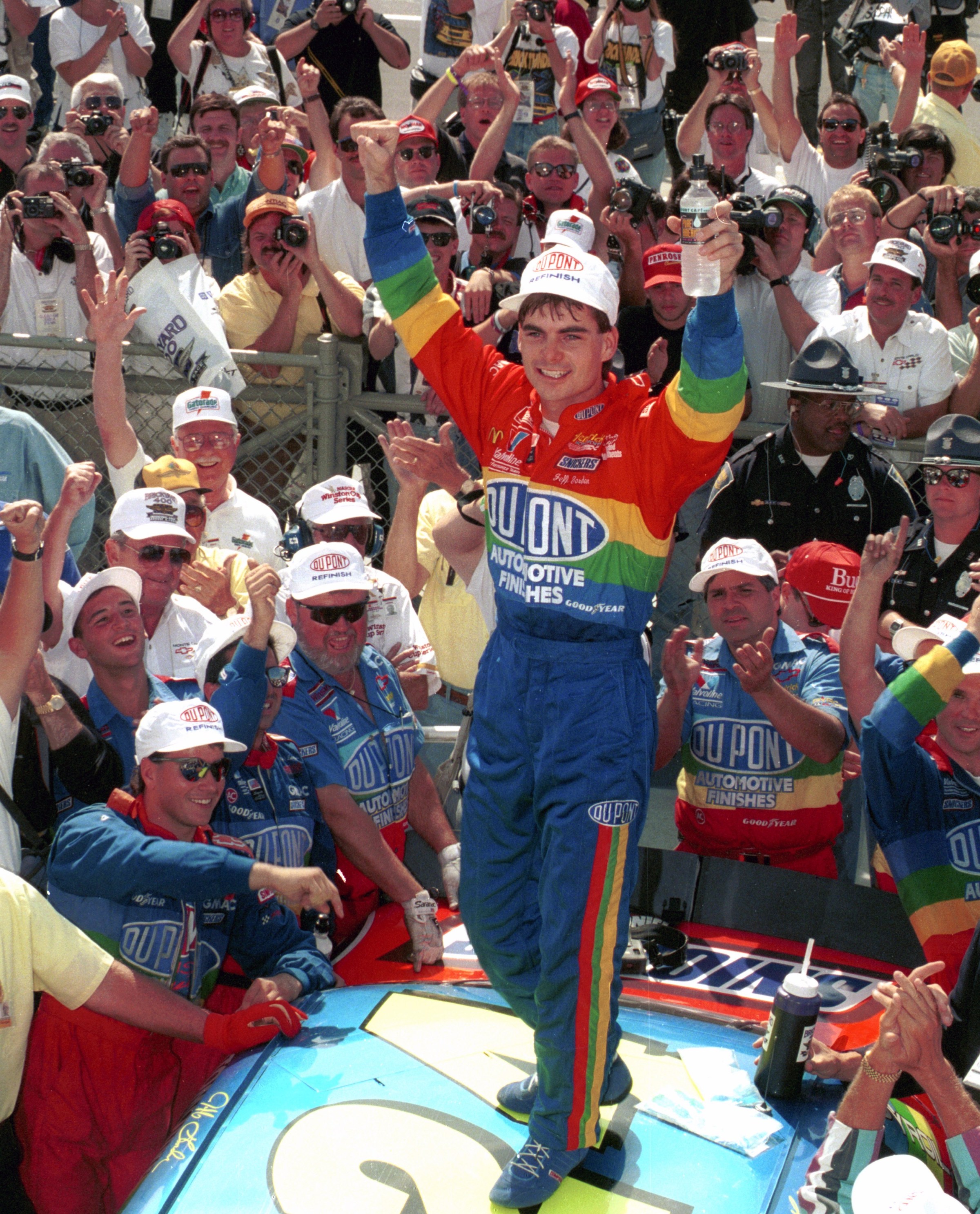SPEEDWAY, IN - AUGUST 6: Driver Jeff Gordon celebrates in Victory Lane after winning the Brickyard 400 race on August 6, 1994 at the Indianapolis Motor Speedway in Speedway, Indiana. (Photo by Dozier Mobley/Getty Images)