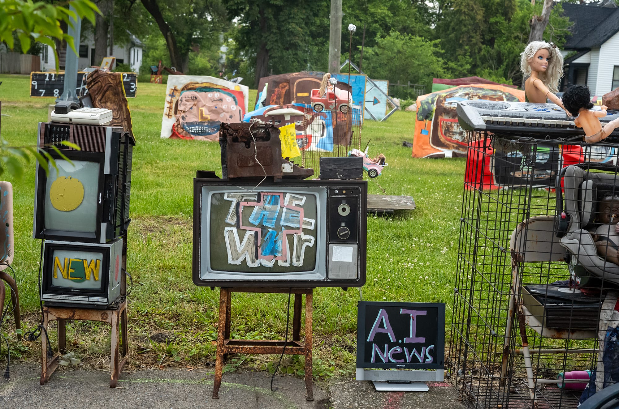 The Heidelberg Project outdoor art environment in Detroit depicting several television sets