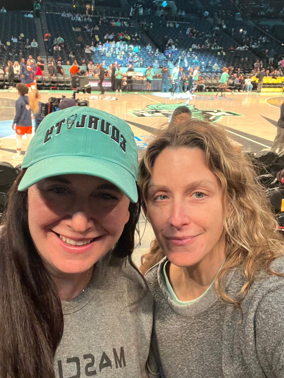 two women at a wnba game