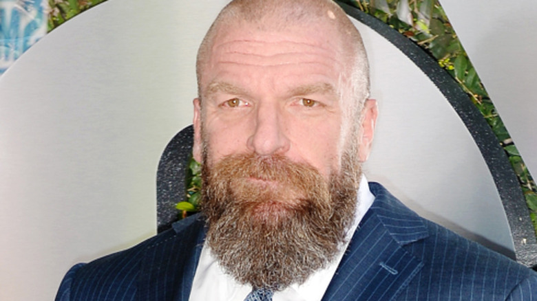 triple h posing on red carpet