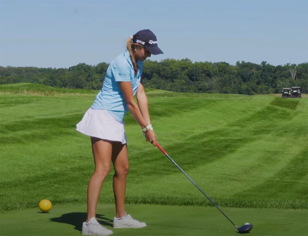 Kai Trump golfing with her grandfather, President Donald Trump at Trump International in Washington DC. 
