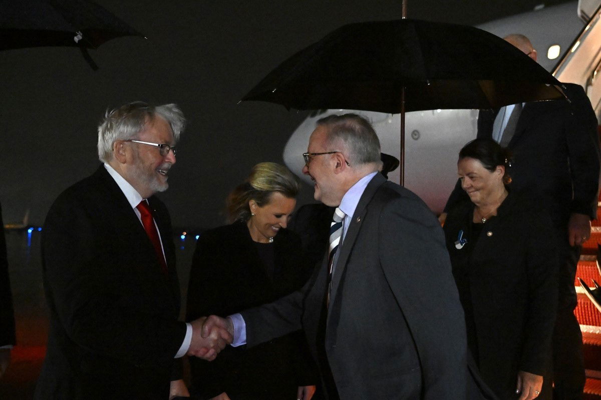 Two men shaking hands.