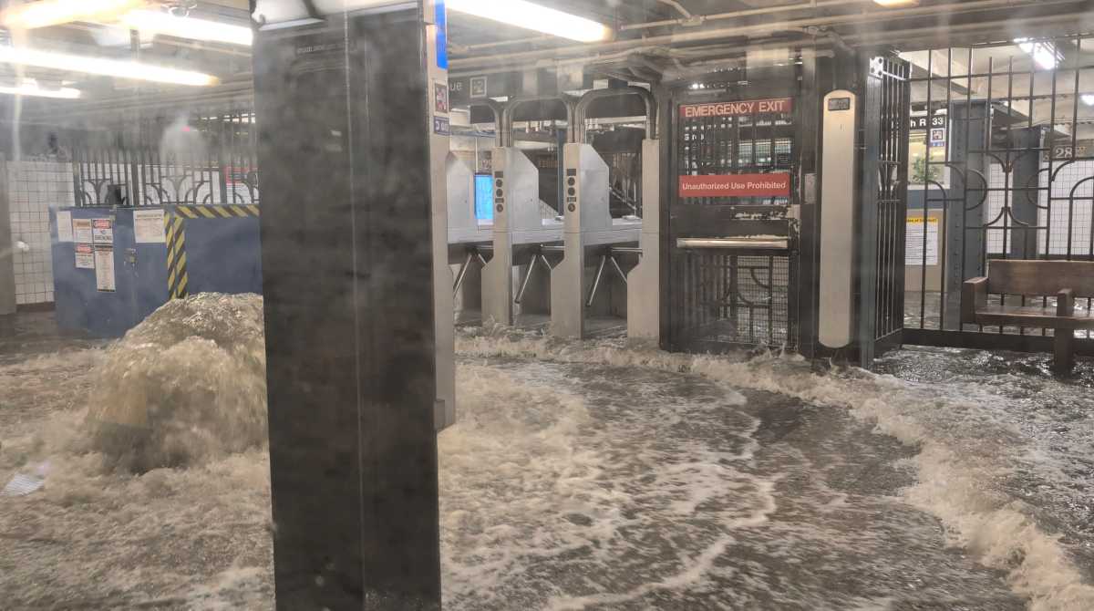 MTA highlights climate resilience roadmap after a year of disruptive flooding 1 A view shows a flooded subway station in New York