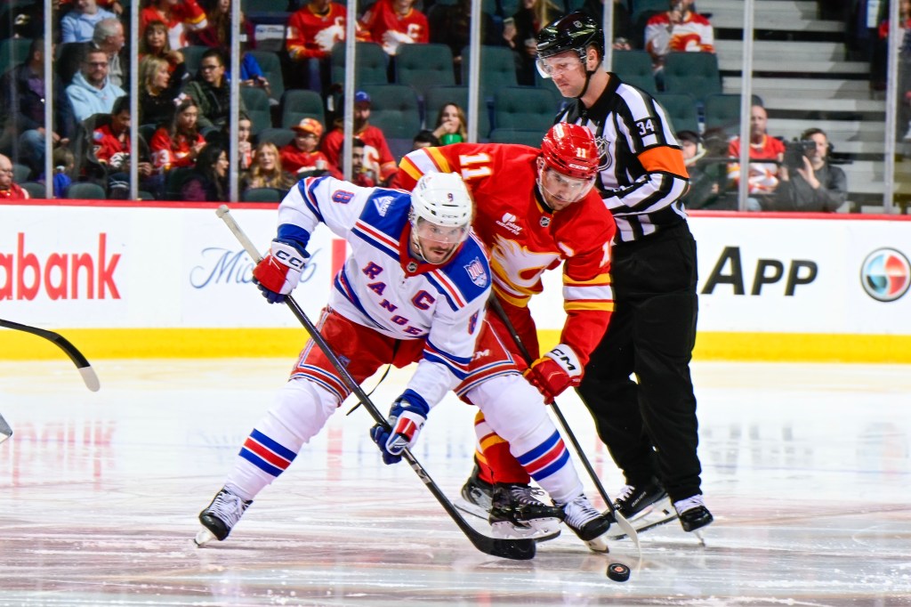 J.T, Miller #8 of the New York Rangers at Scotiabank Saddledome on October 26, 2025 in Calgary, Alberta, Canada.