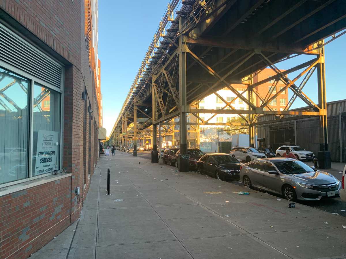 IBX Stop by Stop: East New York, Brownsville poised for more housing, shops and transit as plans for 14-mile light-rail continue 1 new building near train tracks