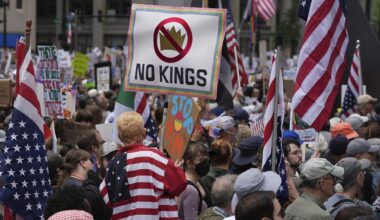 Demonstrators take part in the "No Kings Day" protest, Saturday, June 14, 2025, in Chicago. (AP Photo/Nam Y. Huh)