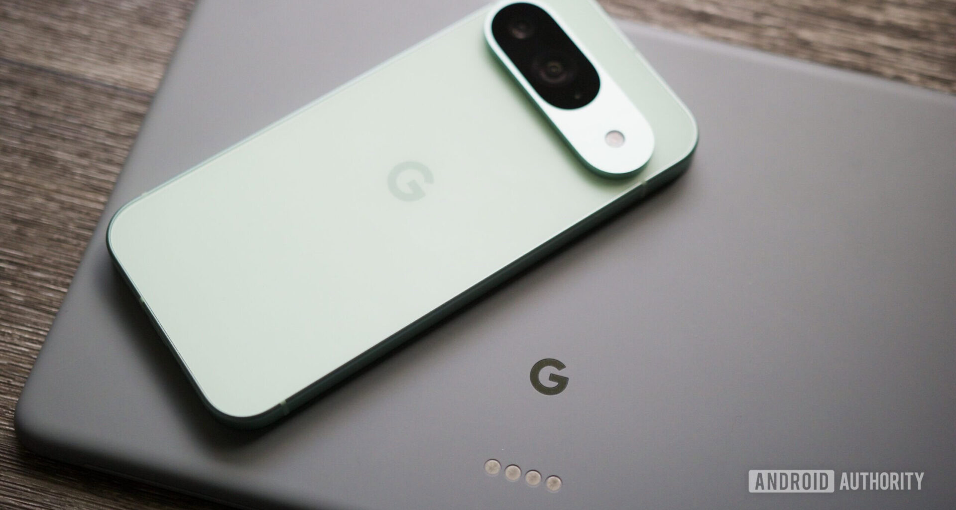 A Google Pixel 9 resting on top of a Pixel Tablet.