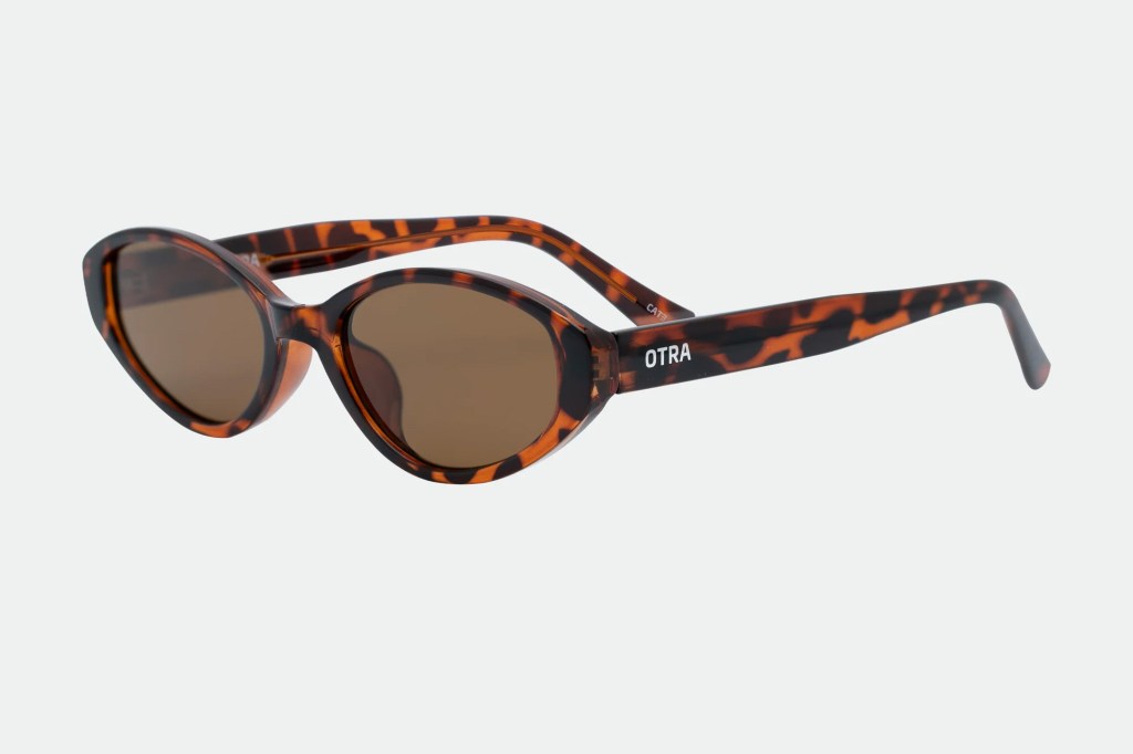 Tortoiseshell OTRA sunglasses with brown tinted lenses.