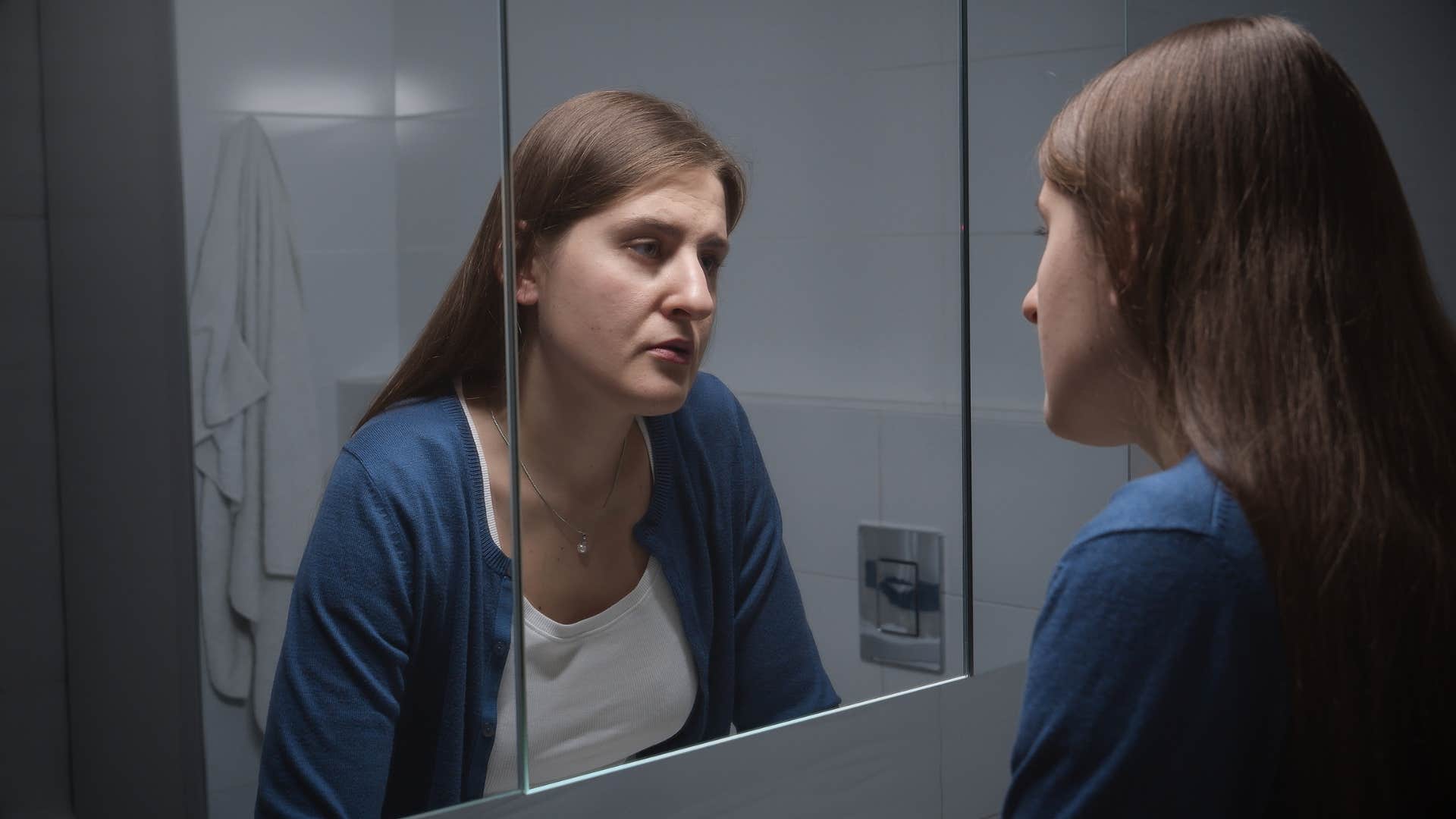 people who make hating taylor swift their whole personality usually have these deeper reasons internalized misogyny woman looking in mirror disliking herself