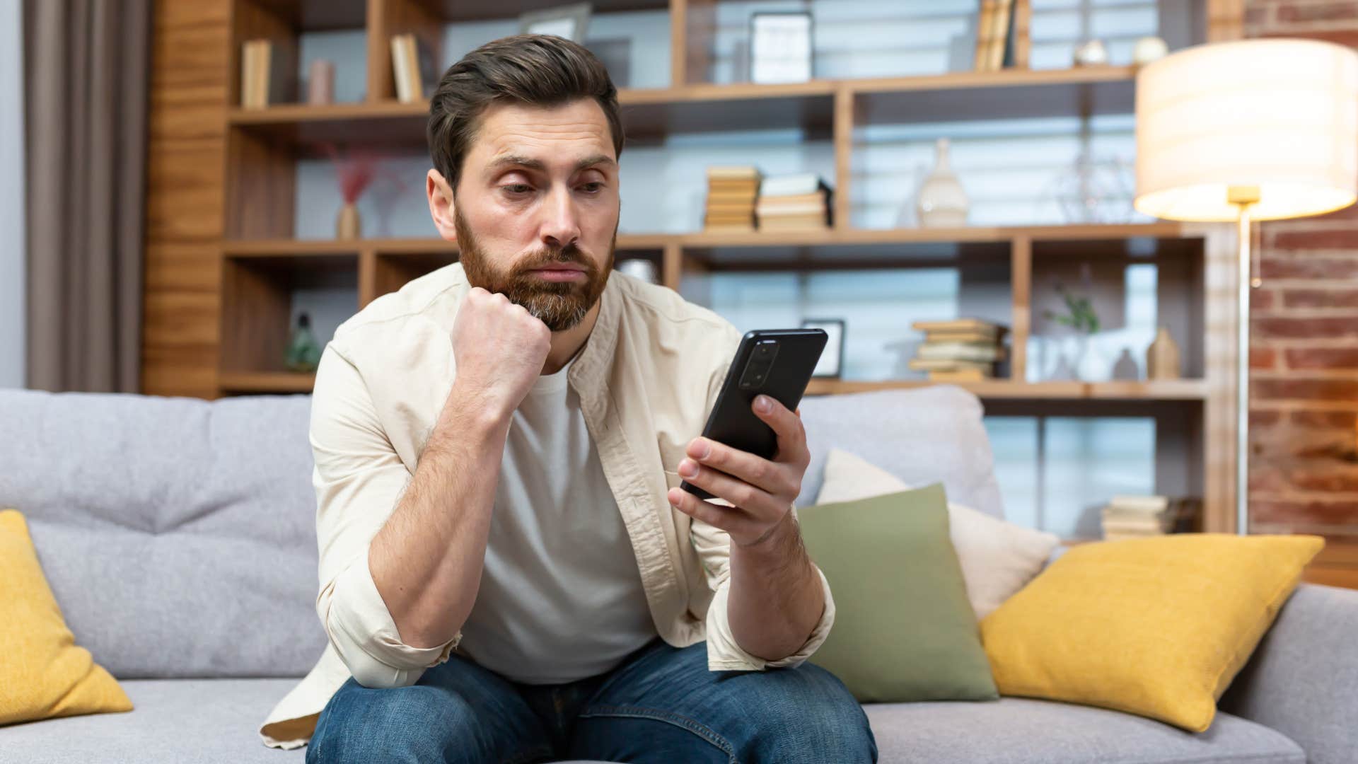 people who make hating taylor swift their whole personality usually have these deeper reasons overexposed annoyed man looking at phone bombarded with taylor swift news