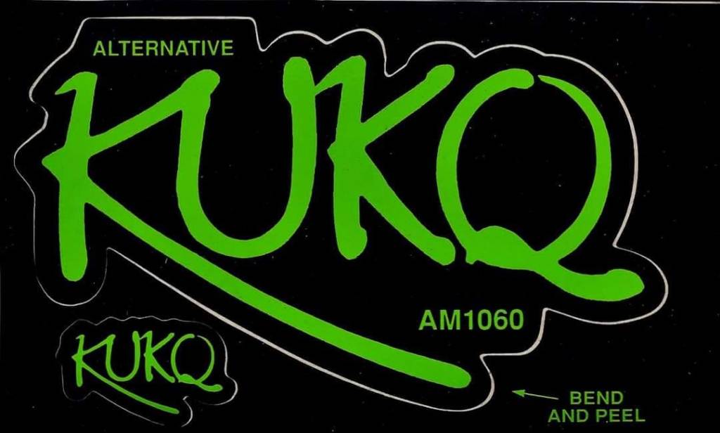 A black and green radio station sticker with the letters KUKQ