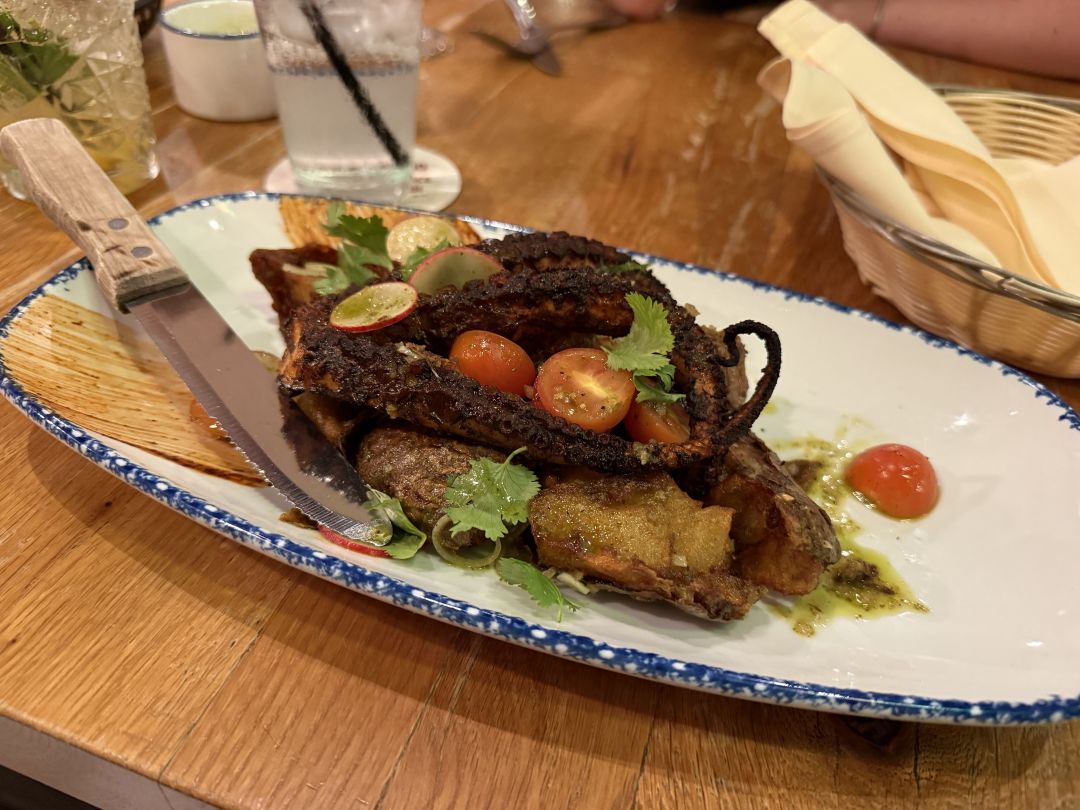 A plate of charred octopus.