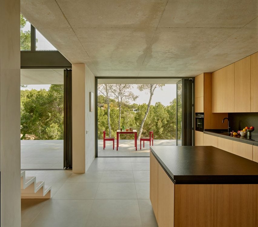 Kitchen interior at concrete home by Rául Sánchez Architects