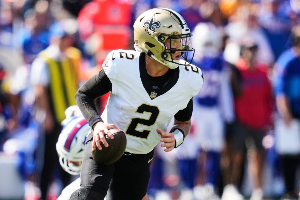 New Orleans Saints quarterback Spencer Rattler (2) scrambles against the Buffalo Bills in the first half of an NFL football game, Sunday, Sept. 28, 2025, in Orchard Park, N.Y.
