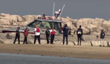 Woman rescued from Lake Michigan at Rainbow Beach; man still missing in water