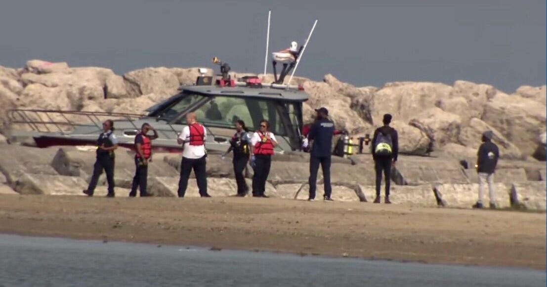Woman rescued from Lake Michigan at Rainbow Beach; man still missing in water