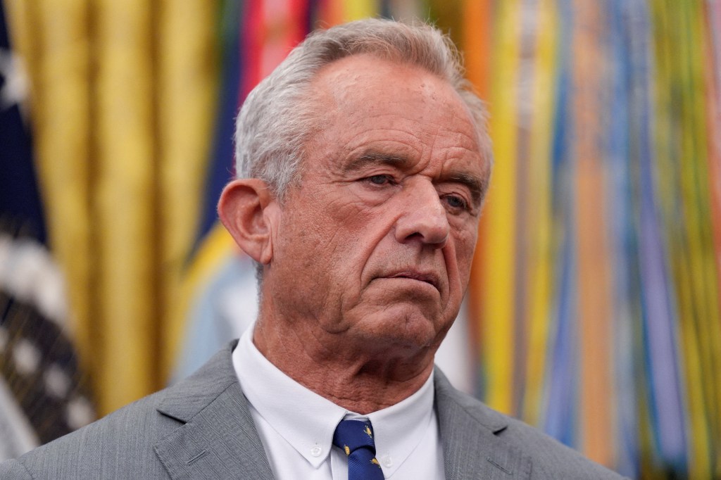 U.S. Health and Human Services (HHS) Secretary Robert F. Kennedy Jr. looks on.