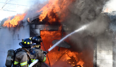 Firefighters Extinguish Highland Park Garage Blaze
