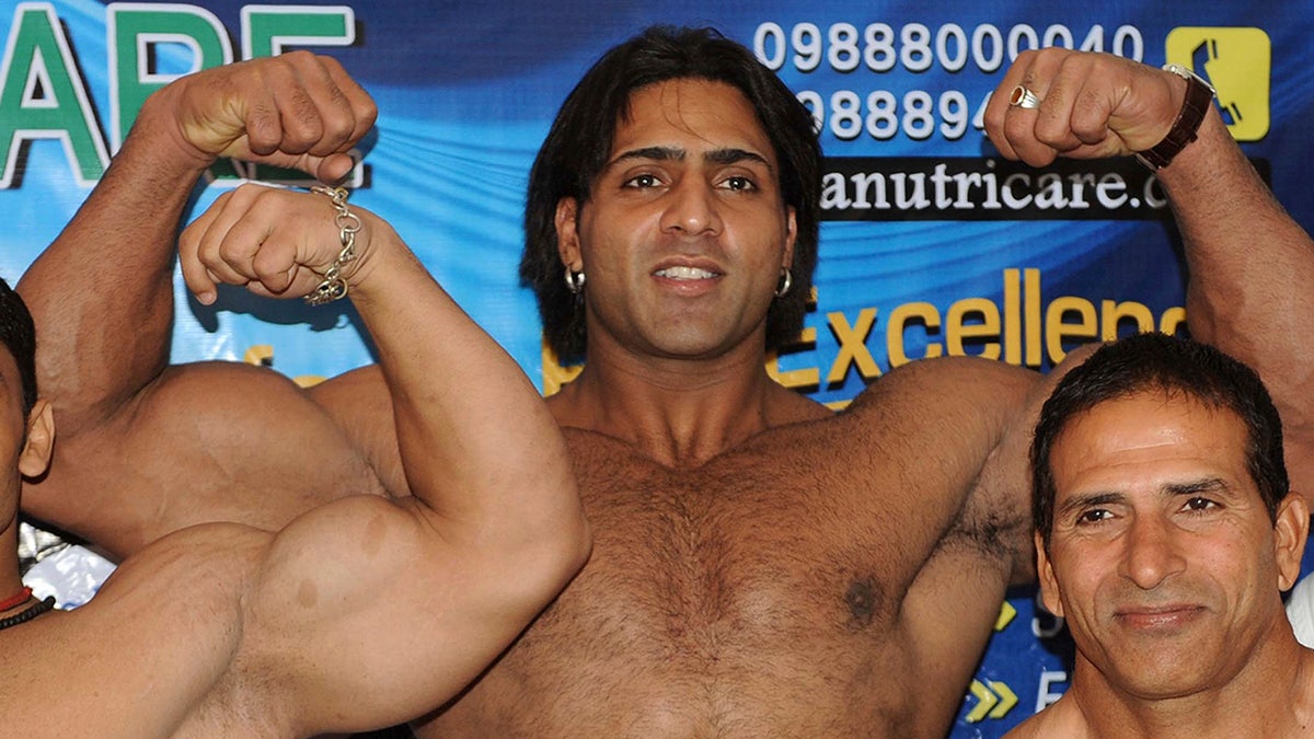 Varinder Singh Ghuman flexing
