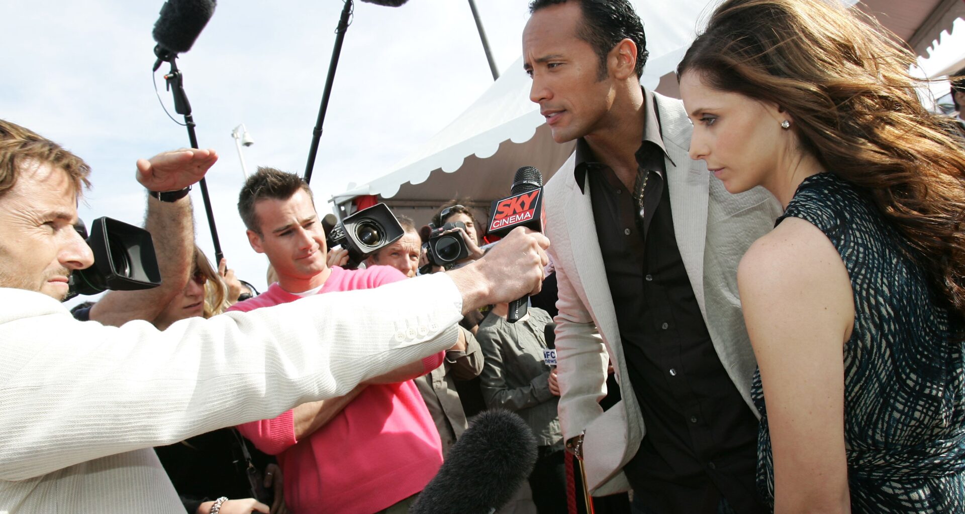 Actors Dwayne Johnson and Sarah Michelle Gellar promote the film Southland Tales at the Palais during the 59th International Cannes Film Festival on May 21, 2006.