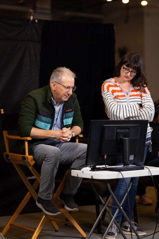 The Old Globe artistic director Barry Edelstein, left, and projection designer Caite Hevner during rehearsals for The Old Globe's "Henry 6" in 2024. The two-play adaptation of William Shakespeare's "Henry VI" plays was written by and directed by Edelstein. (Rich Soublet II)
