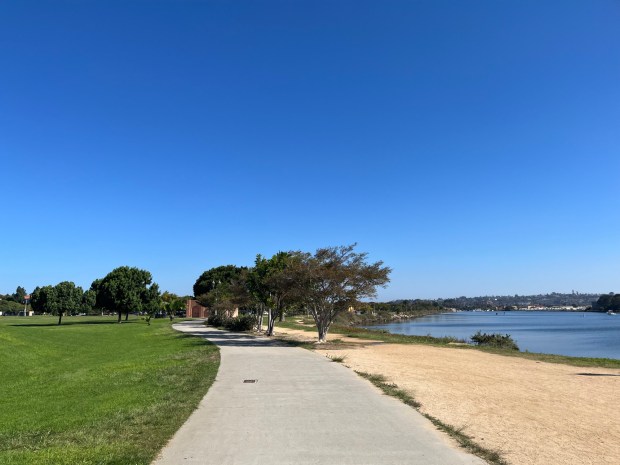 There is both a paved and dirt walking path along the San Diego Bay at Liberty Station. (Maura Fox / The San Diego Union-Tribune)
