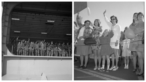 Marines wave as they return home to San Diego from Vietnam aboard the USS Tripoli. Paula Tidwell, 7, center in photo at right, daughter of Lt. Ed Tidwell, greets the Marines on the pier at Naval Air Station North Island. (The San Diego Union-Tribune / San Diego History Center)