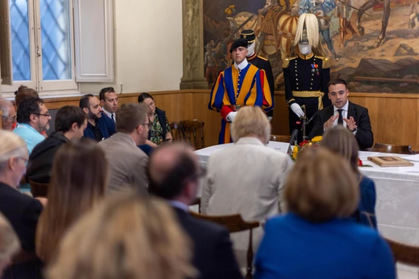 Press officer and guard Eliah Cinotti answers journalists' questions about the Swiss Guards in a room of the Swiss Guards' barracks on Oct. 2, 2025. He said the admission of women to the Swiss Guards is not up for discussion at the moment, but if it were, it would be the pope's decision. Credit: Daniel Ibanez/CNA