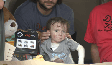 Community rallies with parade for 3-year-old battling rare genetic disorder