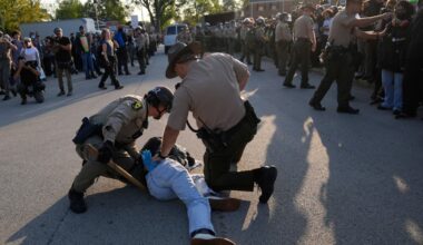 Agents arrest 13, raid city neighborhoods as Noem visits Chicago area ICE facility