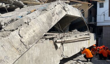 Indonesian rescue workers search for dozens in rubble of collapsed school