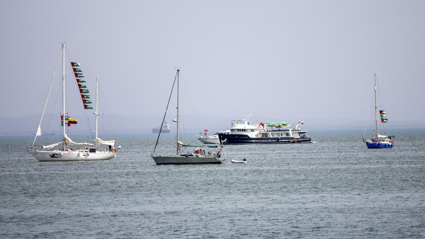 Activists say Israeli navy has begun intercepting a Gaza-bound aid flotilla